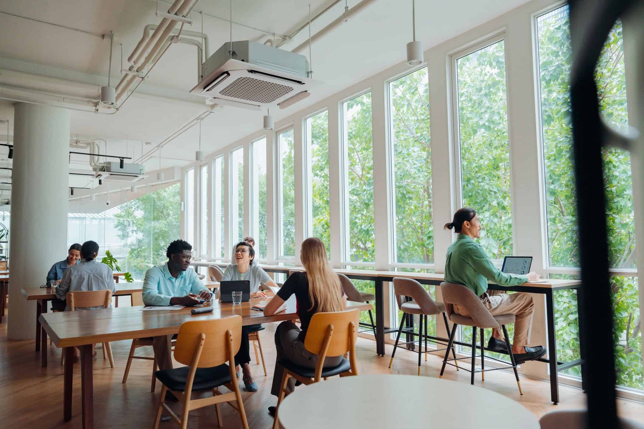 Professionals collaborating in a modern consulting workshop